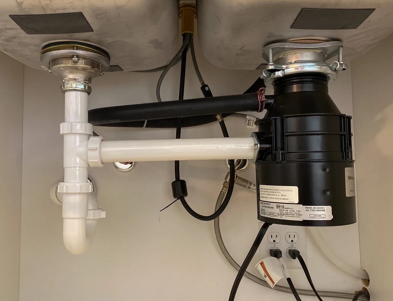 Leaky Garbage Disposal Cleanup in Saint Paul, MN